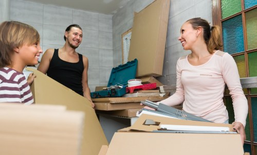 Office relocation planning in Clapham with moving boxes and desks