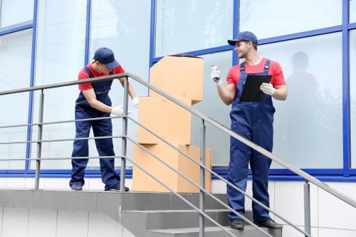 Team member loading items safely into a van