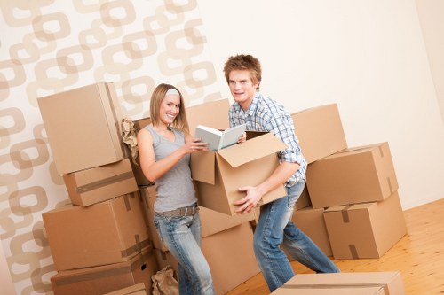 Furniture and boxes being loaded in a Clapham removals van